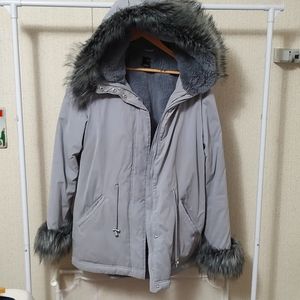 Woman's XL winter coat with faux fur hood.